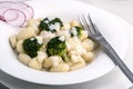 Broccoli gnocchi with cheese sauce