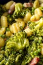 Broccoli gnocchi and green peas fresh prepared food full frame