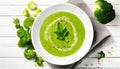 Broccoli green soup with fresh parsley. Healthy and diet vegan dish. Top view on stone table