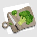 Broccoli side view and cut with a knife on a cutting board, a cob of a cabbage family plant, a small green tree