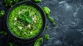 Broccoli, spinach and green peas cream soup on a dark concrete background. Royalty Free Stock Photo