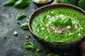 Broccoli, spinach and green peas cream soup on a dark concrete background. Royalty Free Stock Photo