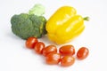 Broccoli, yellow bell peppers and red cherry tomatoes