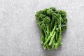 Broccolini. Fresh bunch of broccoli sprouts on a cooking table. Healthy food concept