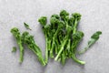 Broccolini. Fresh bunch of broccoli sprouts on a cooking table. Healthy food concept