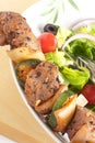 Brochette with Greek salad