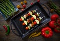 Brochette grill with tomato onion pepper zucchini Royalty Free Stock Photo