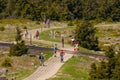 People hiking towards the top of Brocken mountain in Germany