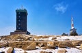 Brocken with radio antenna Architecture tower and water tower on a snowy mountain in the Harz Mountains