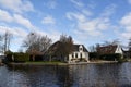 Broek in Waterland, Netherlands. February 2023. The canals and antique wooden houses in Broek in Waterland. Royalty Free Stock Photo