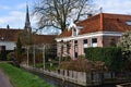 Broek in Waterland, Netherlands. February 2023. The canals and antique wooden houses in Broek in Waterland. Royalty Free Stock Photo