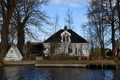 Broek in Waterland, Netherlands. February 2023. The canals and antique wooden houses in Broek in Waterland. Royalty Free Stock Photo