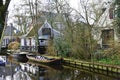 Broek in Waterland, Netherlands. February 2023. The canals and antique wooden houses in Broek in Waterland. Royalty Free Stock Photo