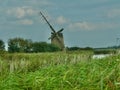 Grasslands and ruined windmill