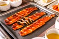 Broiled eels on table in restaurant Royalty Free Stock Photo