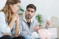 Broke couple with financial problems indoors at new apartment Royalty Free Stock Photo