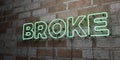 BROKE - Glowing Neon Sign on stonework wall - 3D rendered royalty free stock illustration