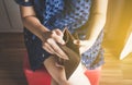 Broke woman hand holding Empty wallet,Concept having cost control expenses,No money Royalty Free Stock Photo