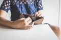 Broke woman hand holding Empty wallet,Concept having cost control expenses,No money Royalty Free Stock Photo