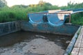 Broken abandoned water slides in the outdoor.