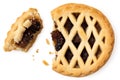 Broken all butter lattice topped mince pie isolated on white from above. Fruit filling visible