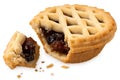 Broken all butter lattice topped mince pie isolated on white. Fruit filling visible