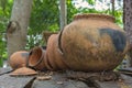 Broken antique clay pot or traditional Jar on abandoned hut Royalty Free Stock Photo