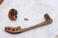 Broken violin parts for restoration