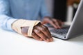 Broken Arm Office Accident. Worker Compensation Royalty Free Stock Photo