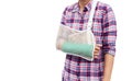 broken arm, woman arm bone broken from accident with green cast Royalty Free Stock Photo