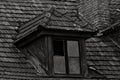 Broken attic window in an old building