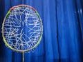 Broken badminton racket on blue background Royalty Free Stock Photo