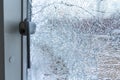 Broken balcony glass door window with shattered glass Royalty Free Stock Photo