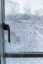 Broken balcony glass door window with shattered glass Royalty Free Stock Photo