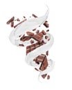 Broken bars of chocolate with swirling milk splashes on a white background Royalty Free Stock Photo