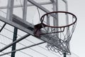 Broken basketball basket with broken glass.