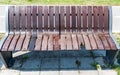 Broken and damaged wooden bench on the street, vandalism concept Royalty Free Stock Photo