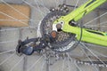 Broken bicycle rear derailleur,a broken bicycle part, a bent chain tipping mechanism Royalty Free Stock Photo