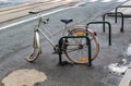 Broken bike thrown on street in the city of Ghent in Belgium