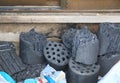 Broken black coal briquette