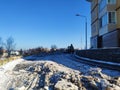 broken blocks of ice on the road. clearing the road of ice and snow in winter