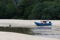 A broken boat on the beach