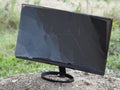 broken monitor thrown to landfill