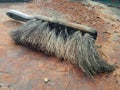Broken brush on the dirty rusty floor Royalty Free Stock Photo