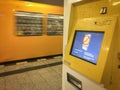 Broken BVG Metro U-Bahn Ticket Vending Machine showing out of order on the display. a train is passing by in the background Royalty Free Stock Photo