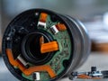 Broken camera lens with internal broken electronics Royalty Free Stock Photo