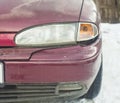 Broken car bumper and headlight