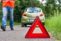 Broken car on the road and unhappy driver Royalty Free Stock Photo