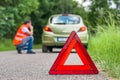 Broken car on the road and unhappy driver Royalty Free Stock Photo