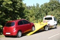 Broken car and tow truck Royalty Free Stock Photo